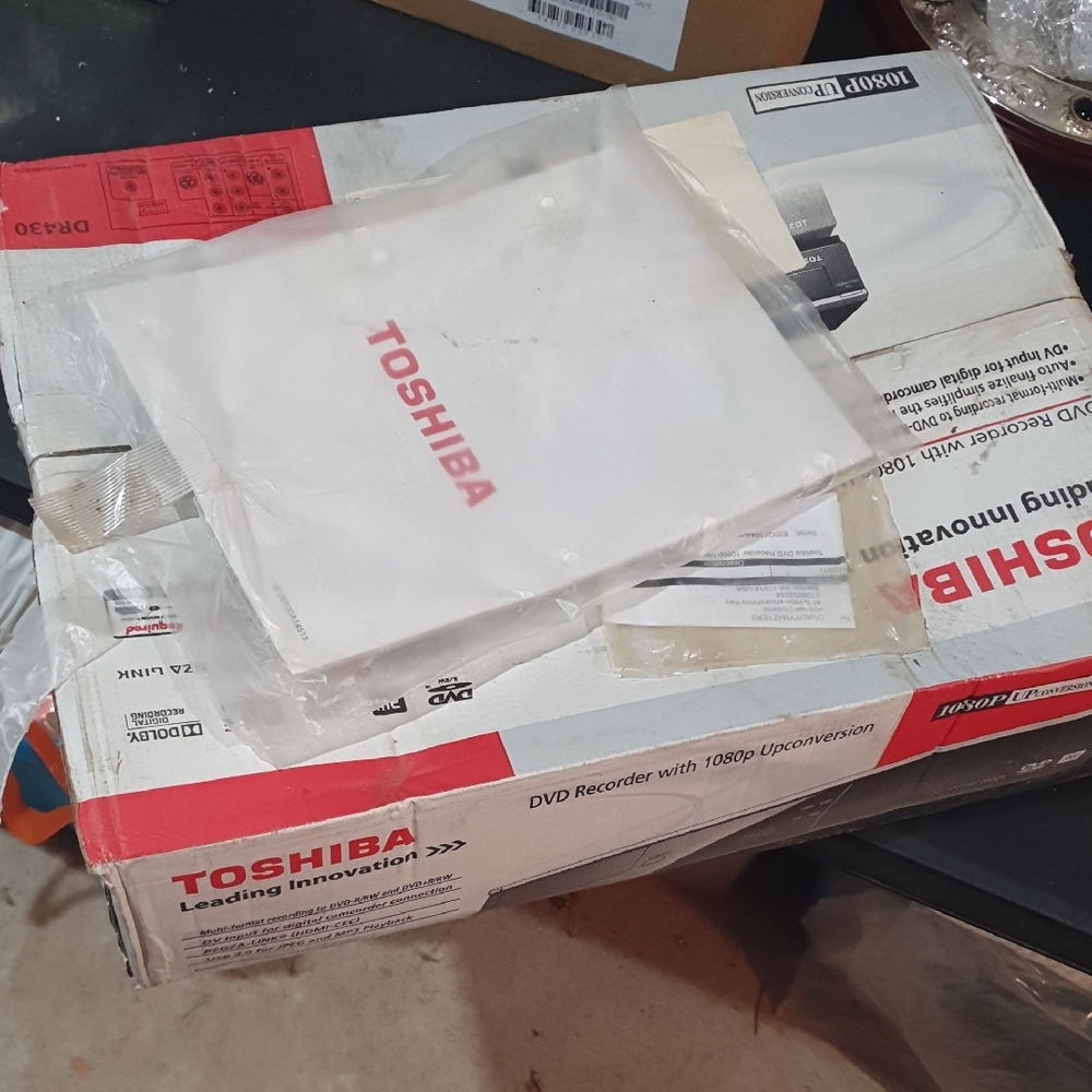 Toshiba DVD Recorder in Red and White Packaging